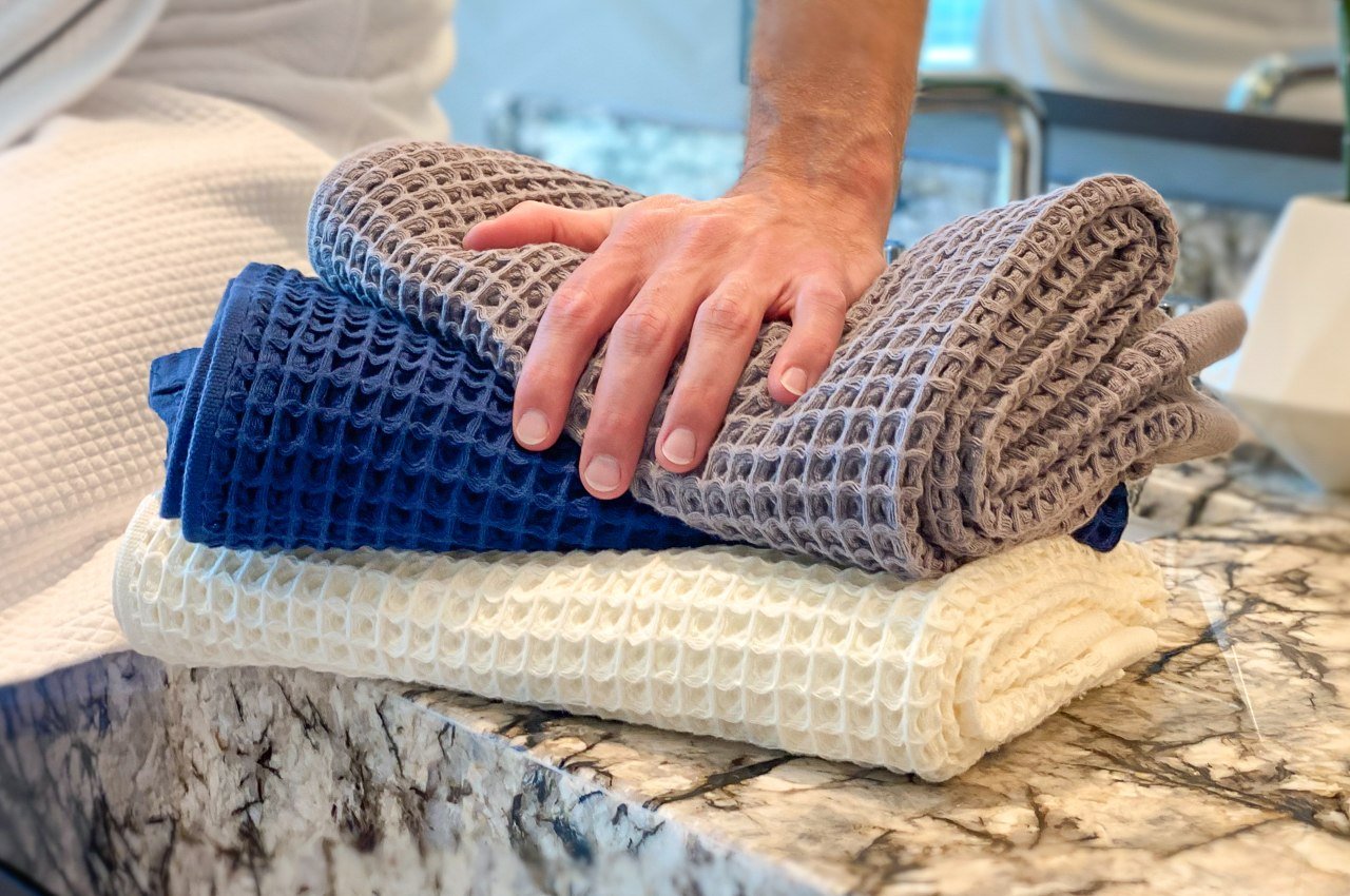 This Smart Bath Towel is designed to soak water as a super sponge waffle.  Here's why it's a shower game changer. - Yanko Design