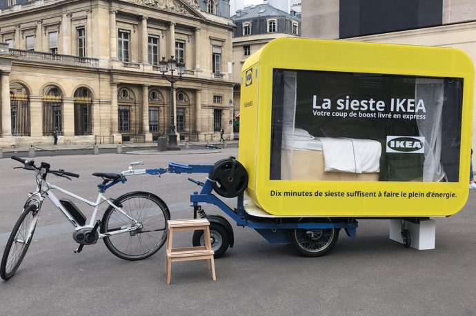 IKEA’s latest Paris project is a fleet of bike-driven sleeping capsules for people to nap in!