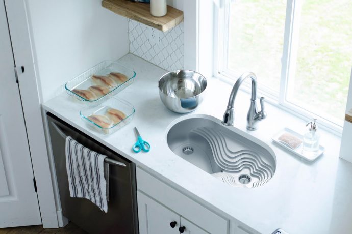This redesign of the kitchen sink was built on a scheme of chamfers and angled edges for one-handed users to use as leverage!