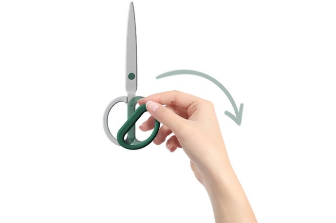 Ambidextrous scissor features a swivel handle to adapt to the left-handed users!