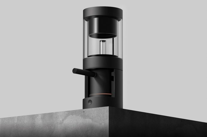 This siphon coffee maker uses its analog mechanisms to bring home the joy of a café