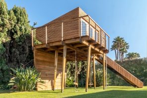 This wooden treehouse is constructed without a tree to minimize environmental impact & maximize adventure!