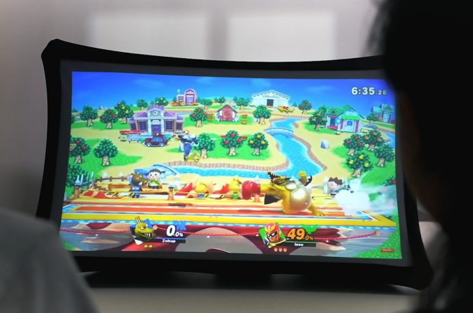This large, portable external display is powered by a detachable, independent ultra-short-throw pico projector