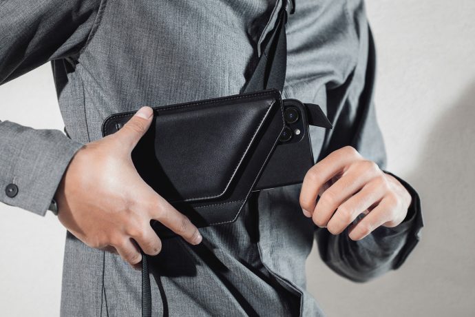 Want to flaunt your new iPhone? How about this crossbody holster that holds your phone and cards