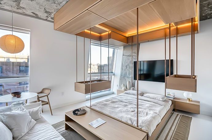 This transforming robotic furniture descending from the ceiling to take your home from bedroom to living room!