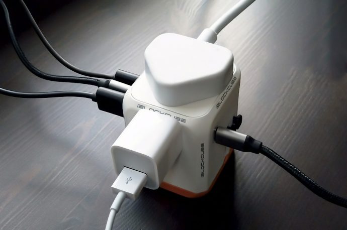 World’s first 2 AC outlet 45W travel adapter simultaneously charges 6 devices + keeps you fast charged in over 150 countries!