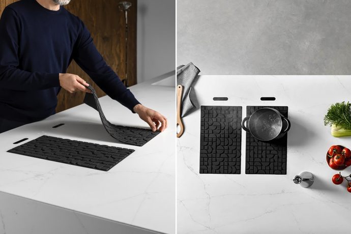 A hidden induction cooking unit is the best part of this modern, tech-savvy kitchen!