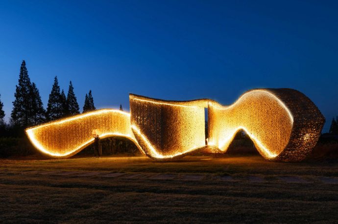 This bamboo pavilion is an interactive design that transforms a rural landscape into a social hub!