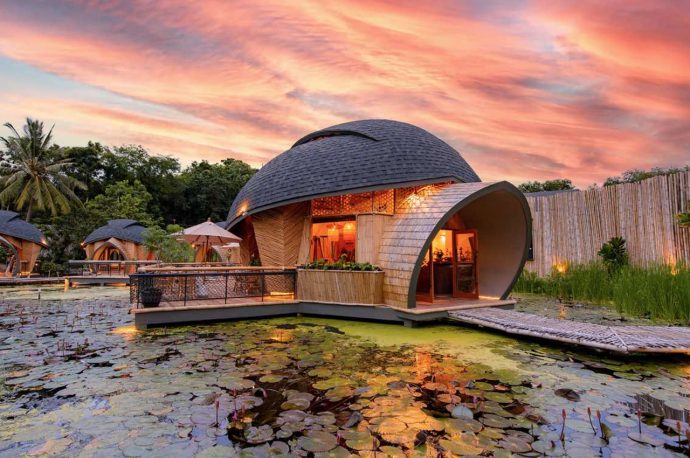 These floating bamboo bungalows make up an eco-tourist hotel that pays homage to the local turtles!