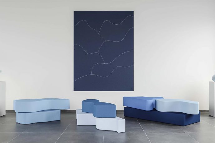 This minimal hanging wall art actually transforms into a modular sofa unit fit for every living room!