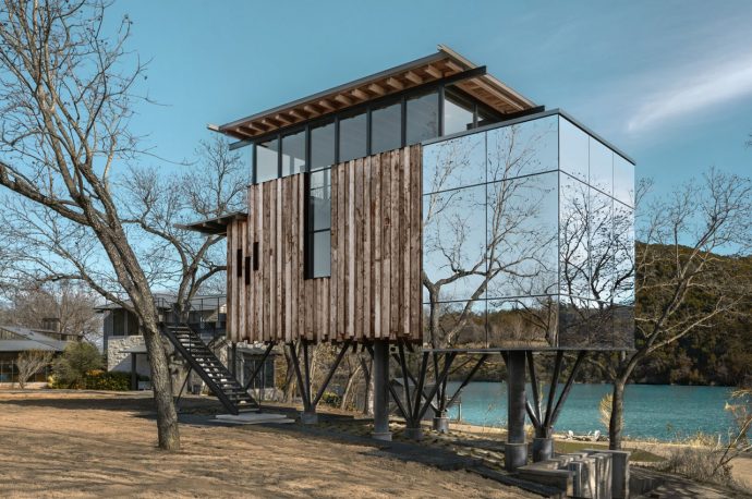 This floating treehouse perched on steel stilts was inspired by the family’s young daughter’s sketch!