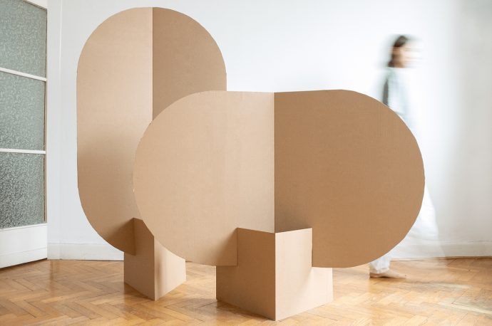 Flatpack cardboard room dividers made from repurposed shipping containers are the easy-to-store furniture you need!