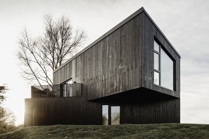 This prefabricated, off-grid home features an upside-down layout to take in all of the outdoor views!
