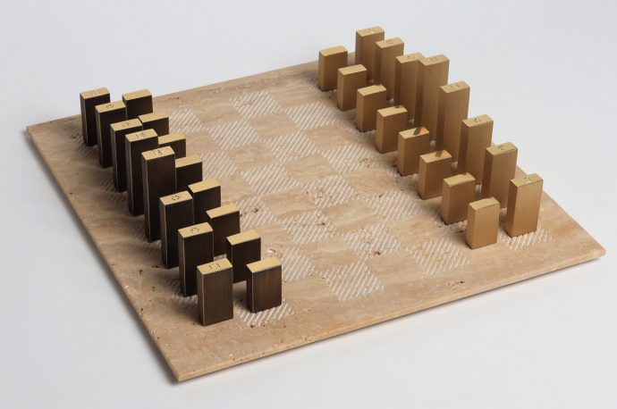 Marble meets stainless steel in this chessboard for a minimalist and artful take on the timeless chess game!