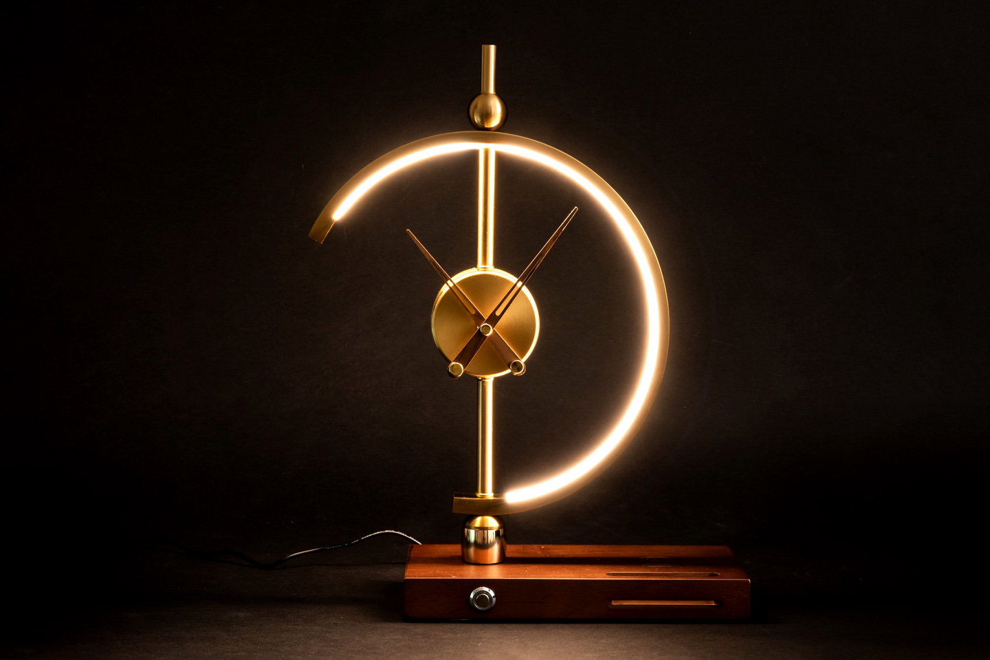 The Khonsu clock lamp is a weirdly attractive tabletop accent piece that also wirelessly charges your phone