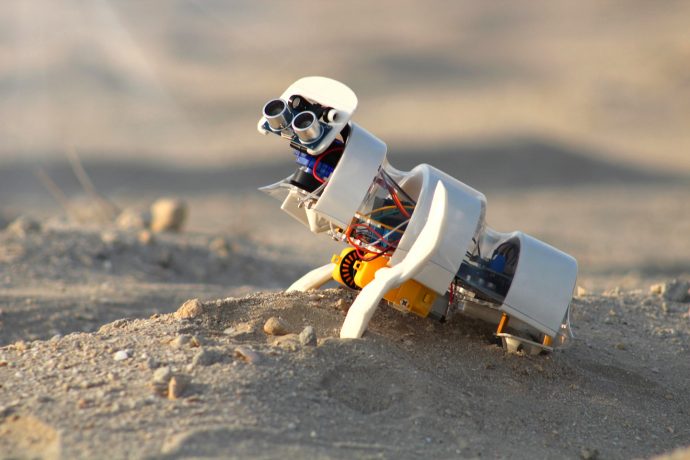 Tiny autonomous solar-powered robot roams around on deserts, planting seeds to cultivate greenery