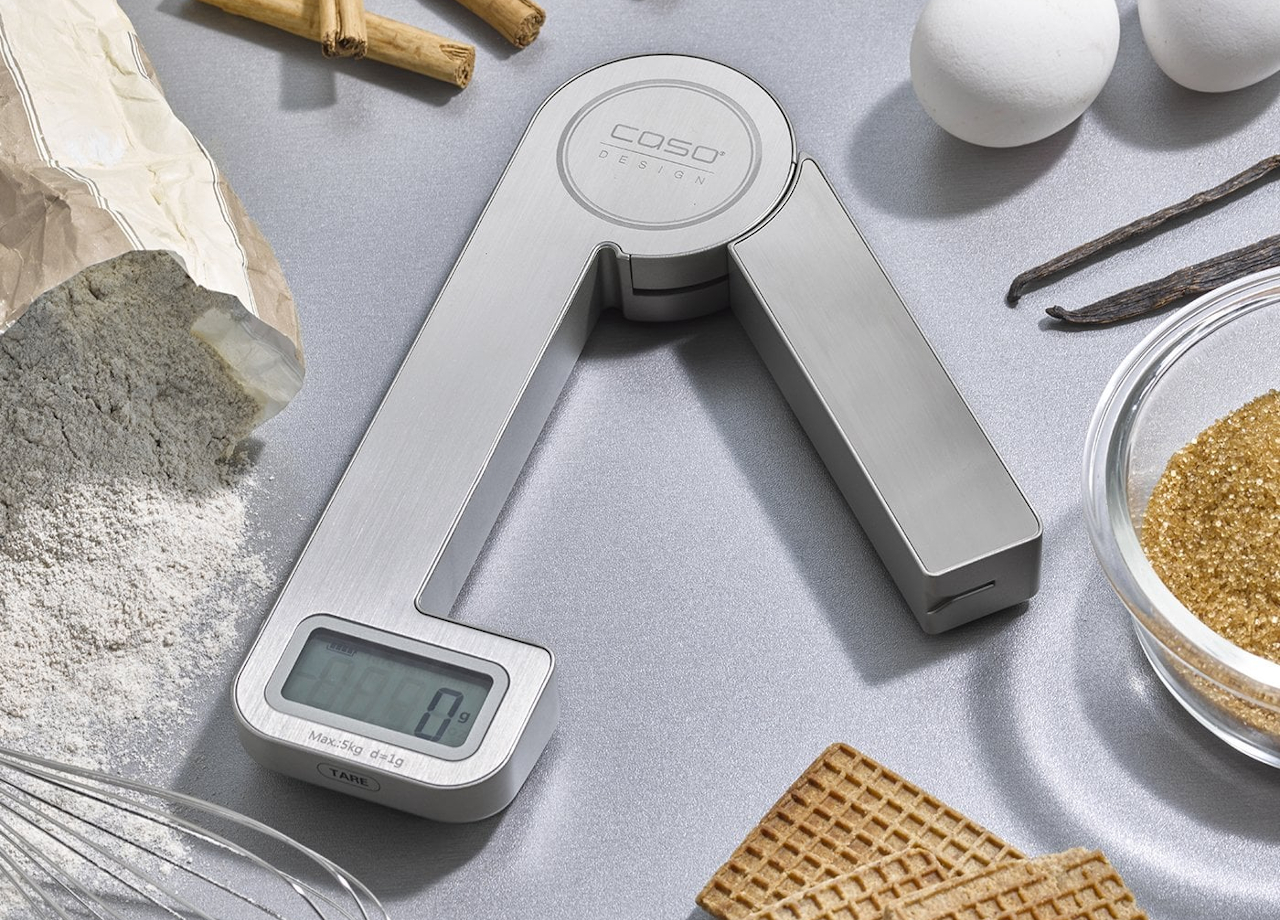 A folding digital kitchen scale that uses kinetic energy to help you go battery-free
