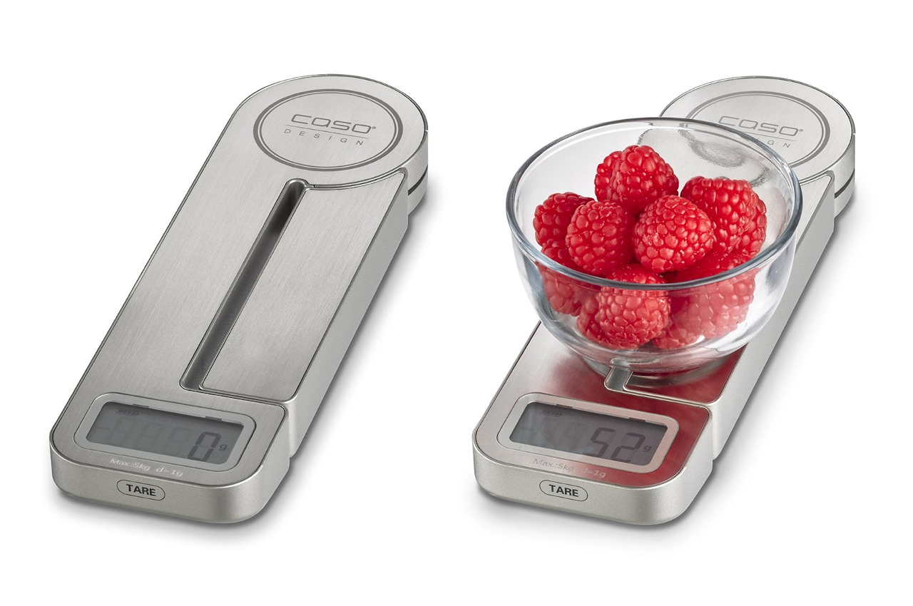 A folding digital kitchen scale that uses kinetic energy to help