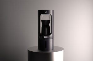 A sleek, automatic pour-over coffee machine designed to fit right on your desk as you WFH