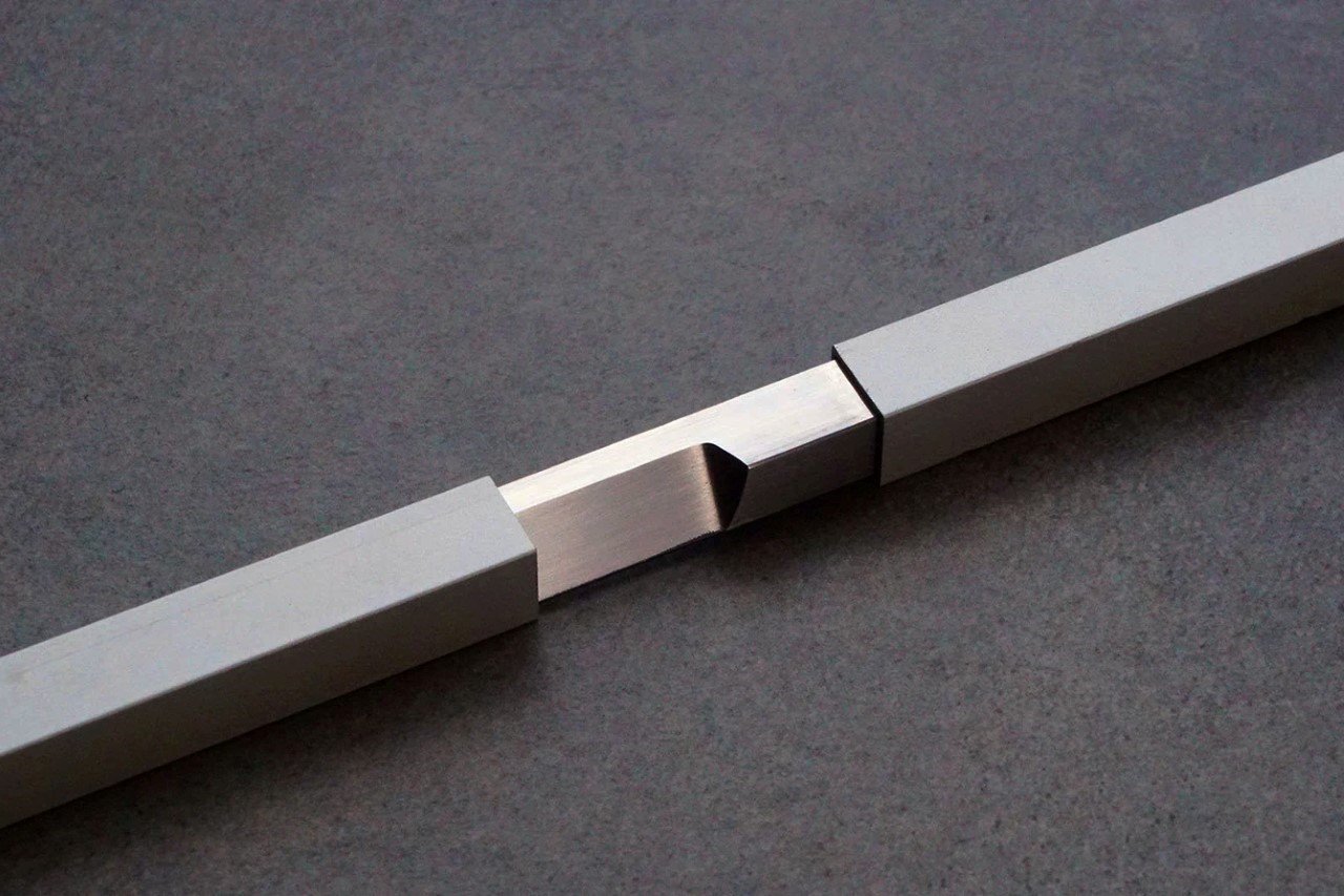 https://www.yankodesign.com/images/design_news/2022/01/this-beautiful-handmade-katana-style-knife-is-an-absolute-masterclass-in-minimalism/square_tube_knife_2.jpg
