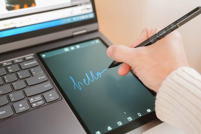Lenovo’s latest laptop comes with a secondary screen to keep you productive + creative in the strangest way