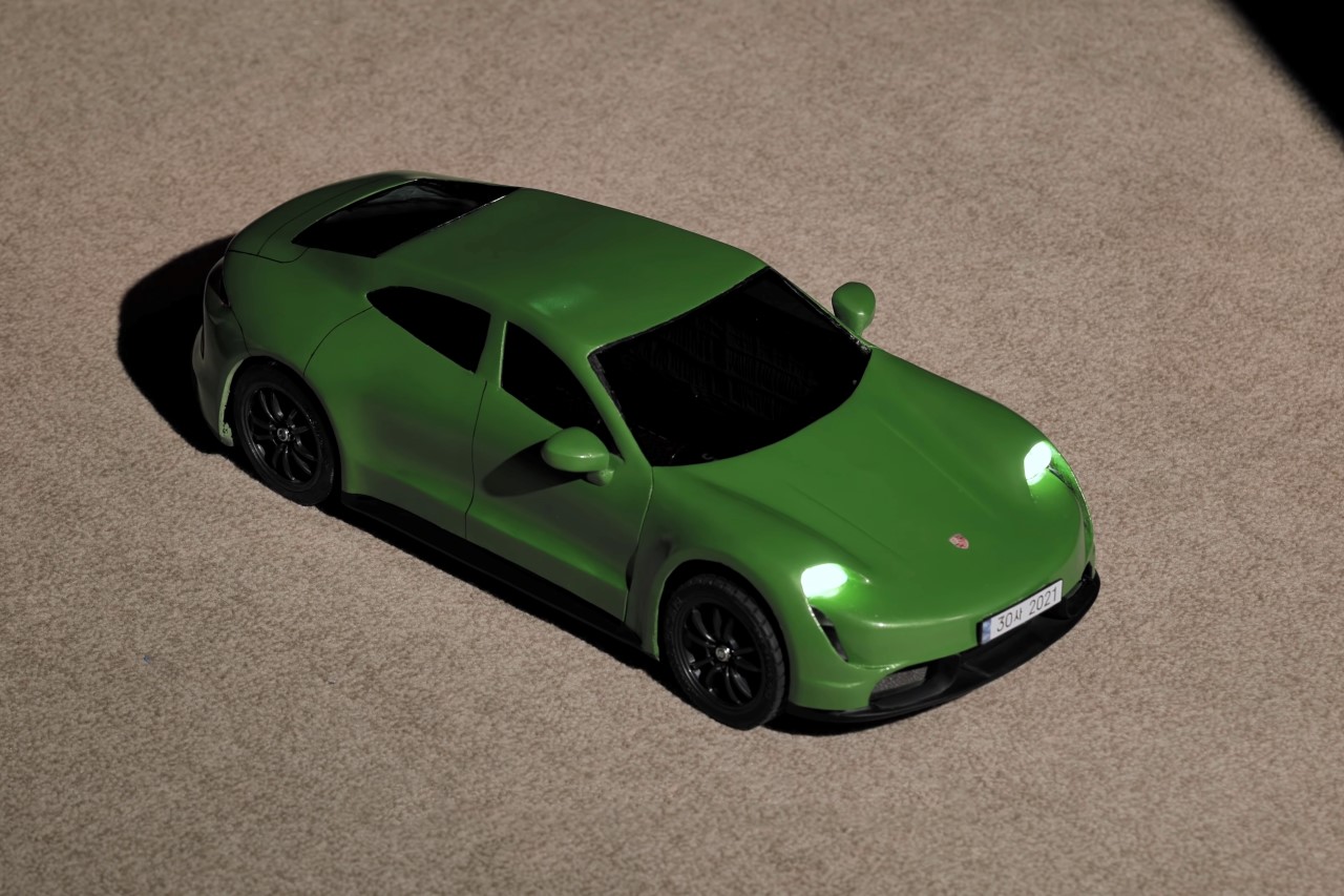 This Porsche Taycan scale-down model was constructed using a 3D