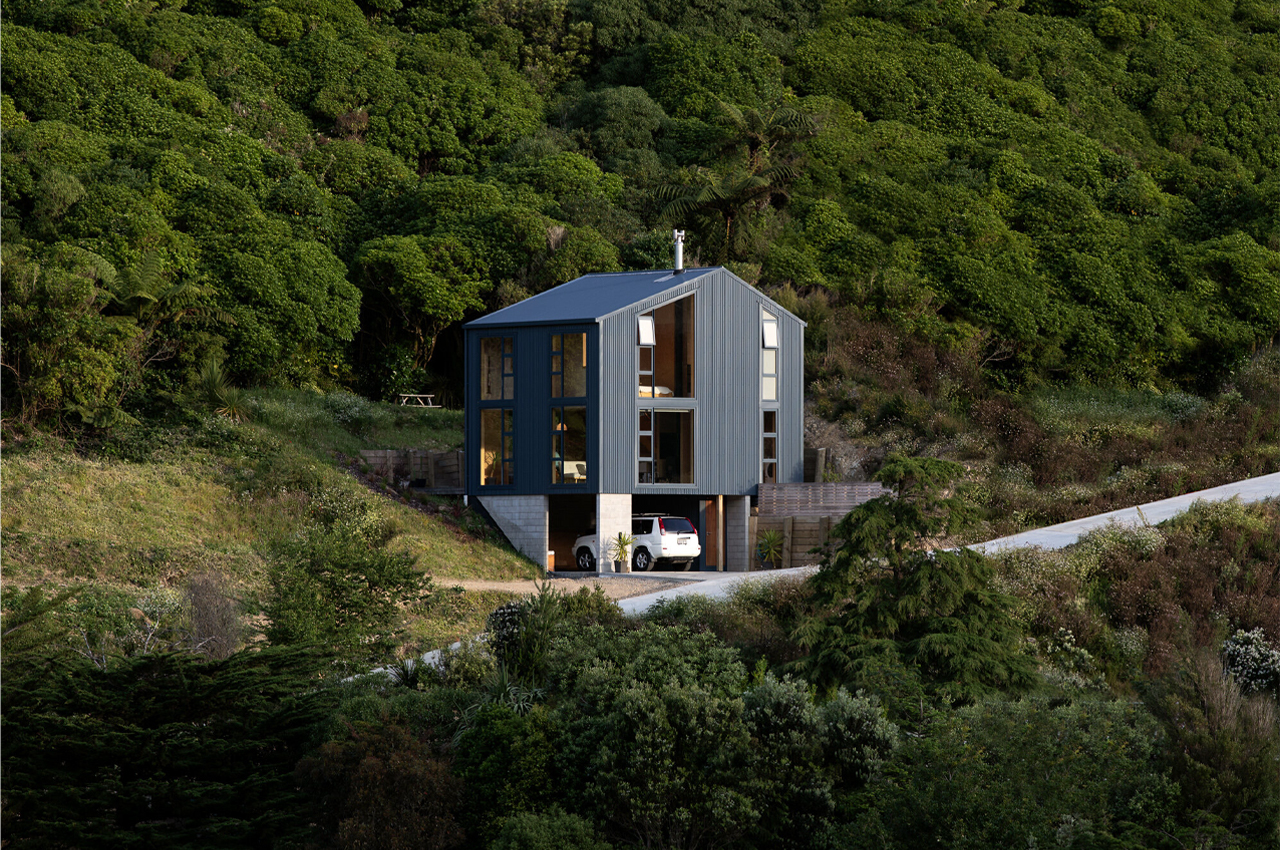 #This compact home finds harmony with New Zealand’s landscape through off-grid features and a small footprint