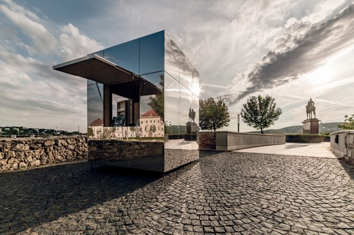 These mirrored visitor centers were built in harmony with a 13th-century castle to reflect the castle grounds