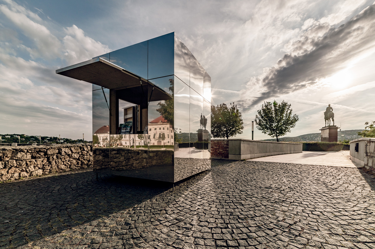 #These mirrored visitor centers were built in harmony with a 13th-century castle to reflect the castle grounds
