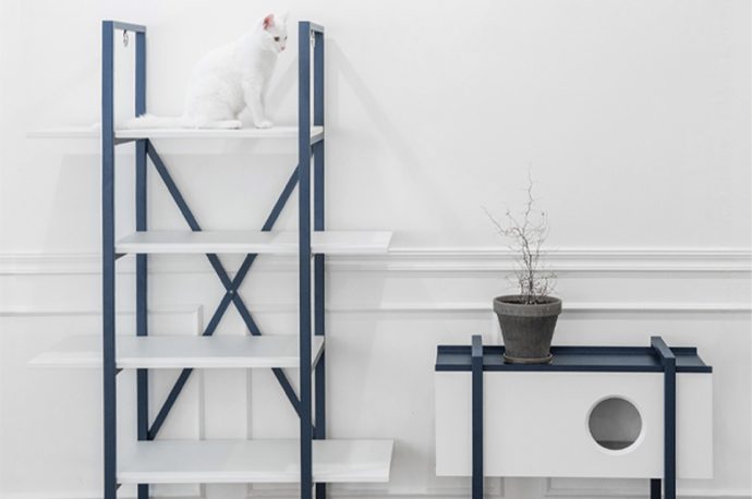 This minimalist furniture piece for cats is a hybrid of a bookshelf and tower where cats can play and rest