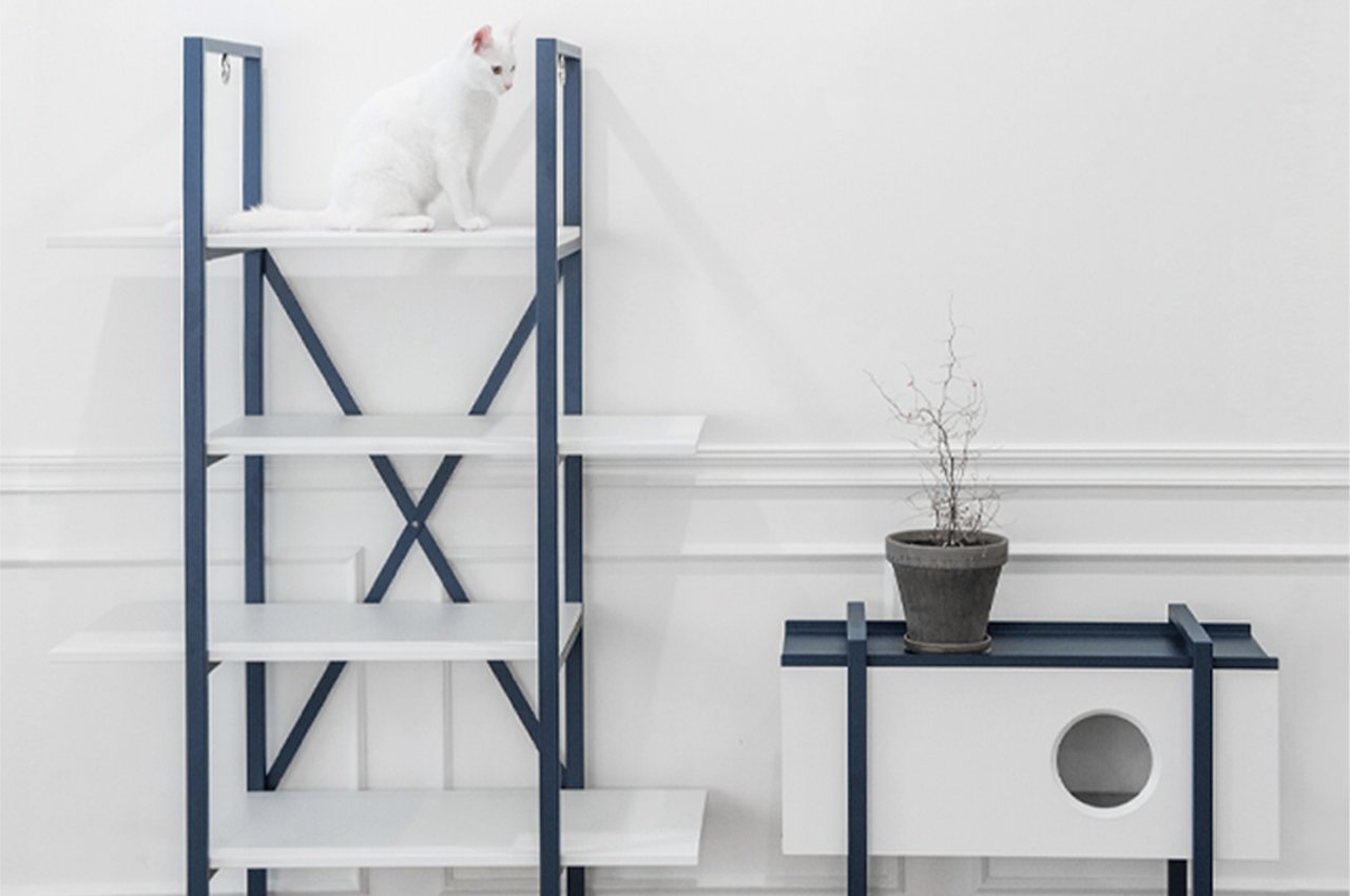 This minimalist furniture piece for cats is a hybrid of a bookshelf and tower where cats can play and rest