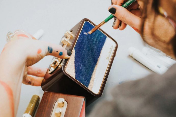 Customizable wireless speaker comes with a blank fabric canvas that you can paint artworks on