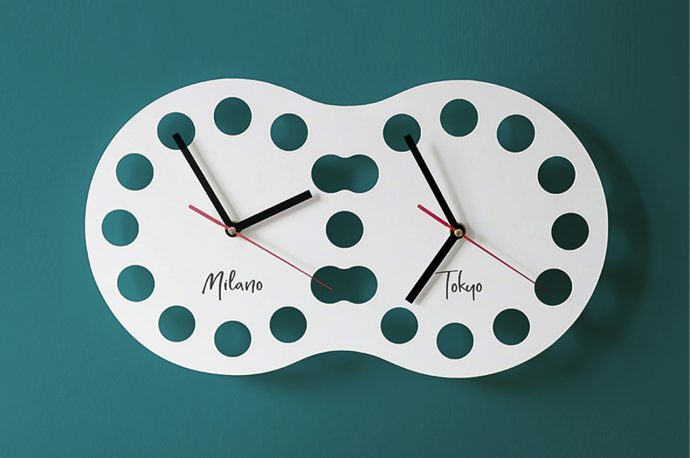 This customizable wall clock merges the dials displaying two different countries’ timezone