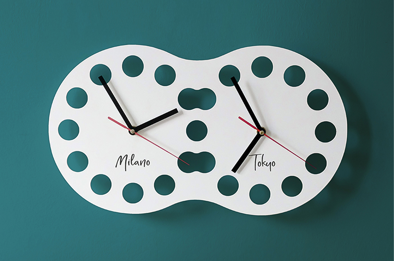 #This customizable wall clock merges the dials displaying two different countries’ timezone