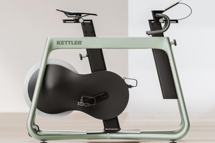 This at-home spin bike combines an industrial-grade build with warm interior design cues
