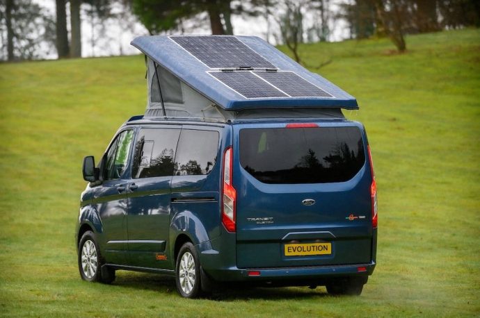 Solar panel loaded Ford Transit campervan is a spacious + practical option for outdoor enthusiasts
