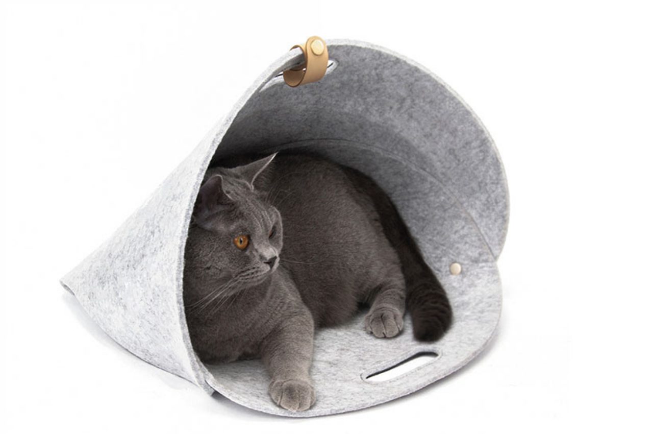 #Cat nest is a flat-folding design that lets your feline pet rest, travel in style