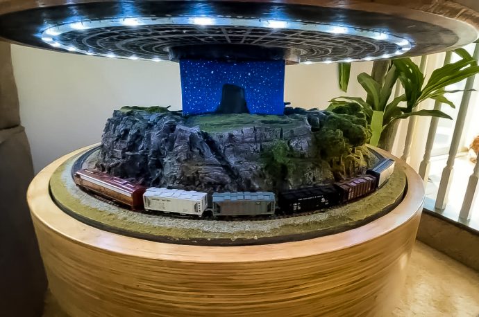 This hidden train side table is a design and engineering masterpiece
