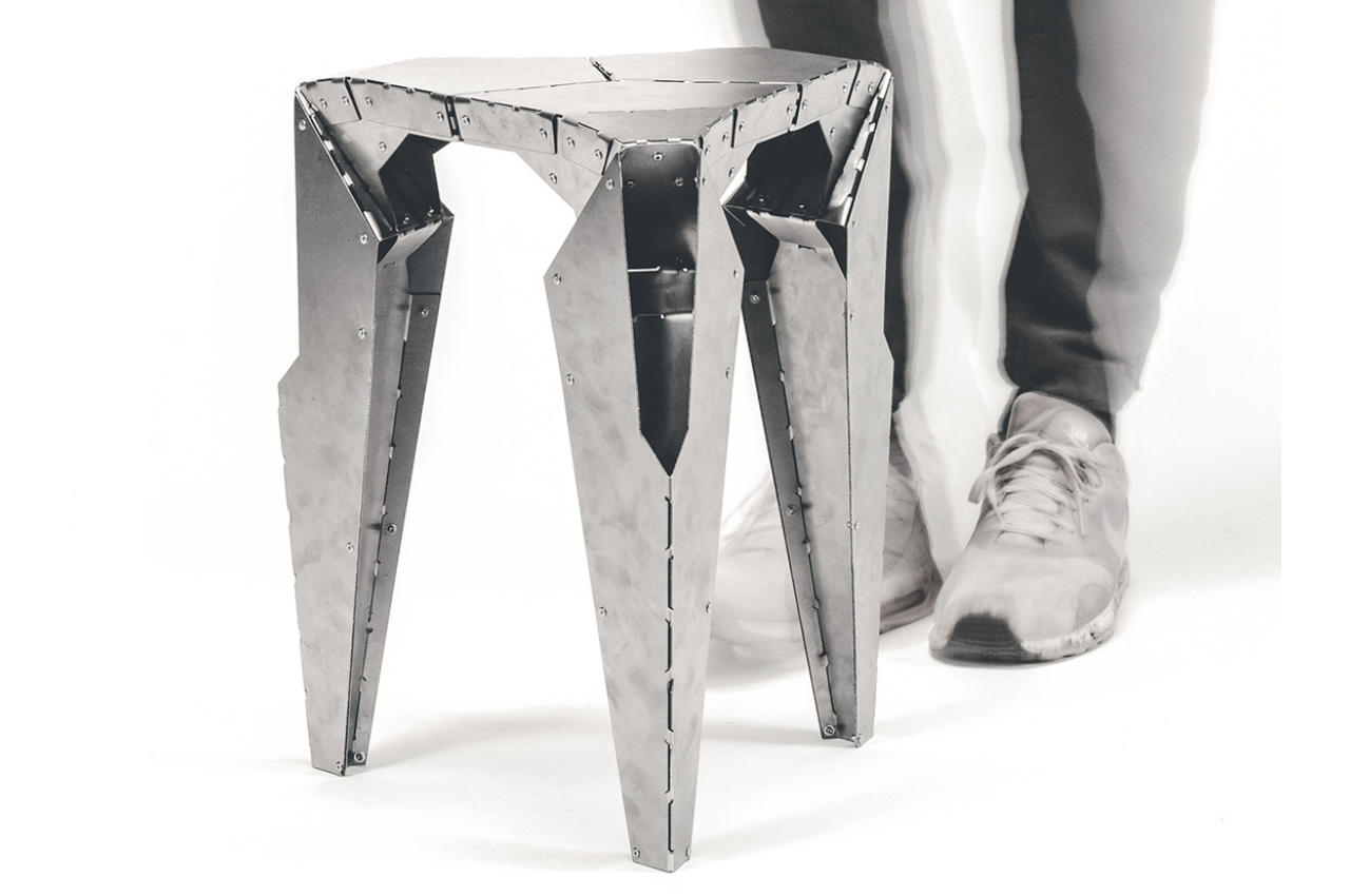 #This laser-cut steel stool looks like a parked spaceship from a sci-fi film