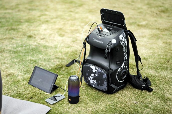 This DSLR-inspired hardshell backpack packs a portable power station that can charge your E-bike