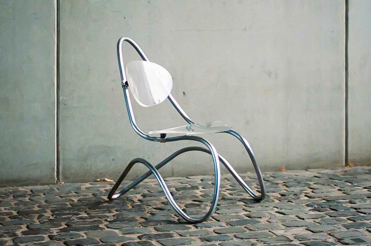 #C1 Budde Lounge Chair’s form is made of a single line of stainless steel