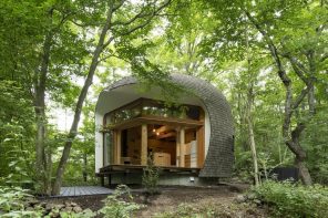 Shell House is an organic-looking timber cabin in the woods of Japan