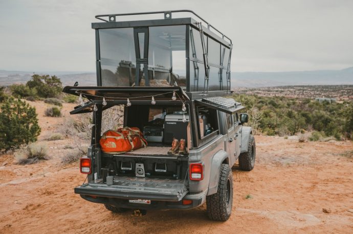 This transparent pop-topper camper’s panoramic windows lets you experience the majestic outdoors
