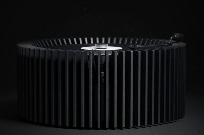 Vinyl player uses electric vehicle motor design for industrial look