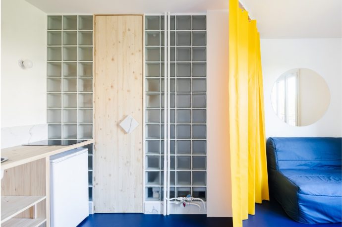 Tiny apartment turns into “bigger” and colorful space