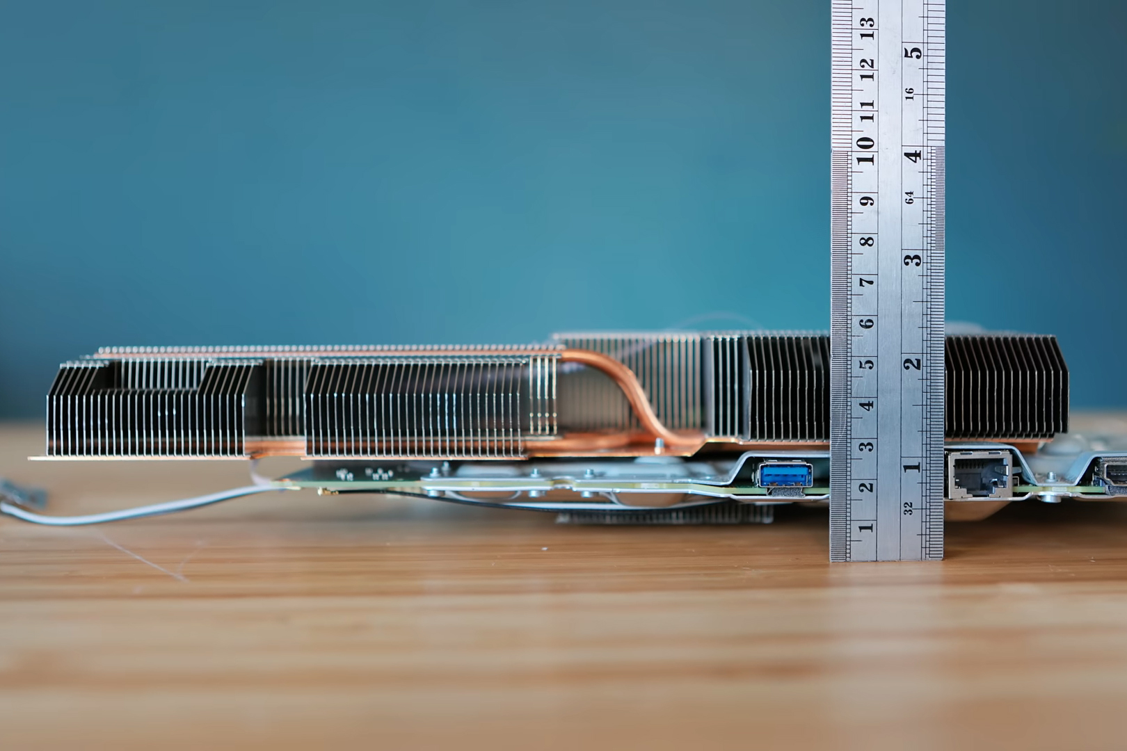 DIY PS5 Slim hides a water-cooling brick behind a TV cabinet, almost melts