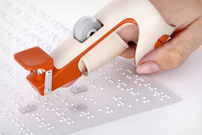 This wearable tape-dispenser can help correct Braille typos and misprints