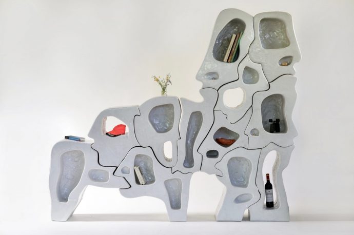 These shelves look like abstract art of faces gazing at you and your collection