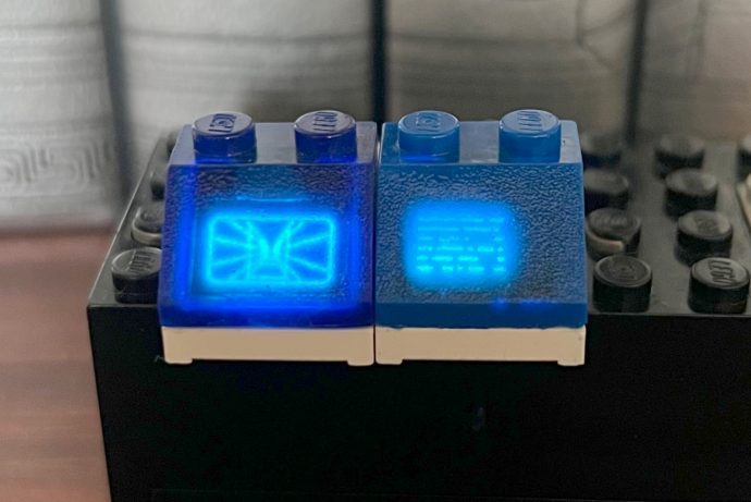 This LEGO brick actually comes with a functional OLED screen and touch-sensitive controls