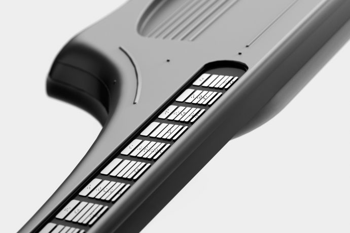 Electric Guitar with Braille fretboard helps the visually impaired master a new instrument